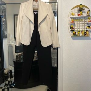 Like new, worn 1x and dry cleaned Calvin Klein black & cream suit